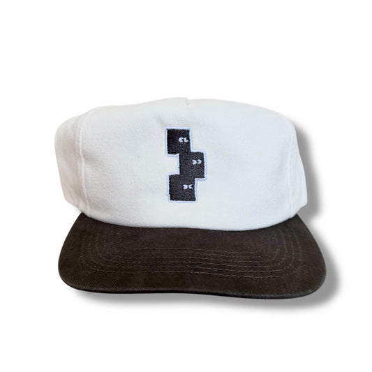 WASHED BLACK AND CREAM 5 PANEL SNAPBACK HAT