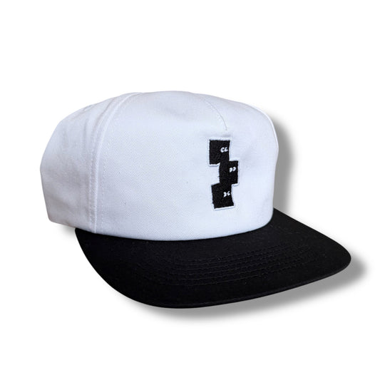 BLACK AND WHITE 5 PANEL SNAPBACK HAT
