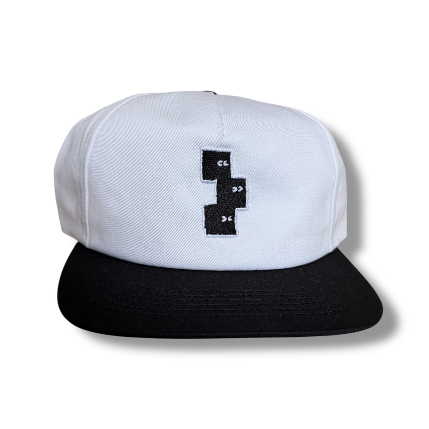 BLACK AND WHITE 5 PANEL SNAPBACK HAT