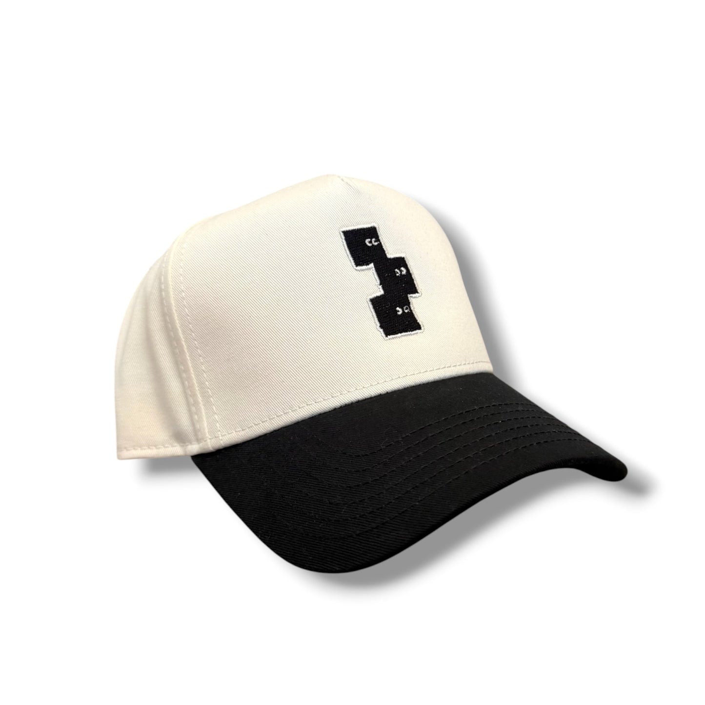 CREAM AND BLACK STRUCTURED FRAME SNAPBACK HAT